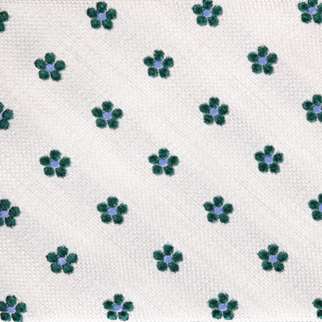 Fiori verde scuro su garza bianco