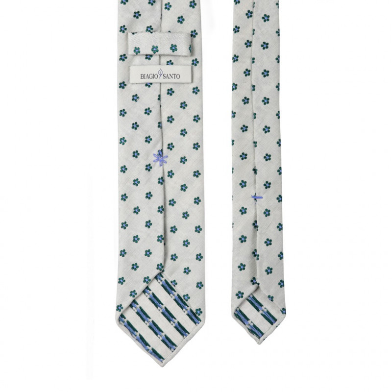 Fiori verde scuro su garza bianco Fiori verde scuro su garza bianco