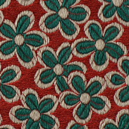 Green daisy on red